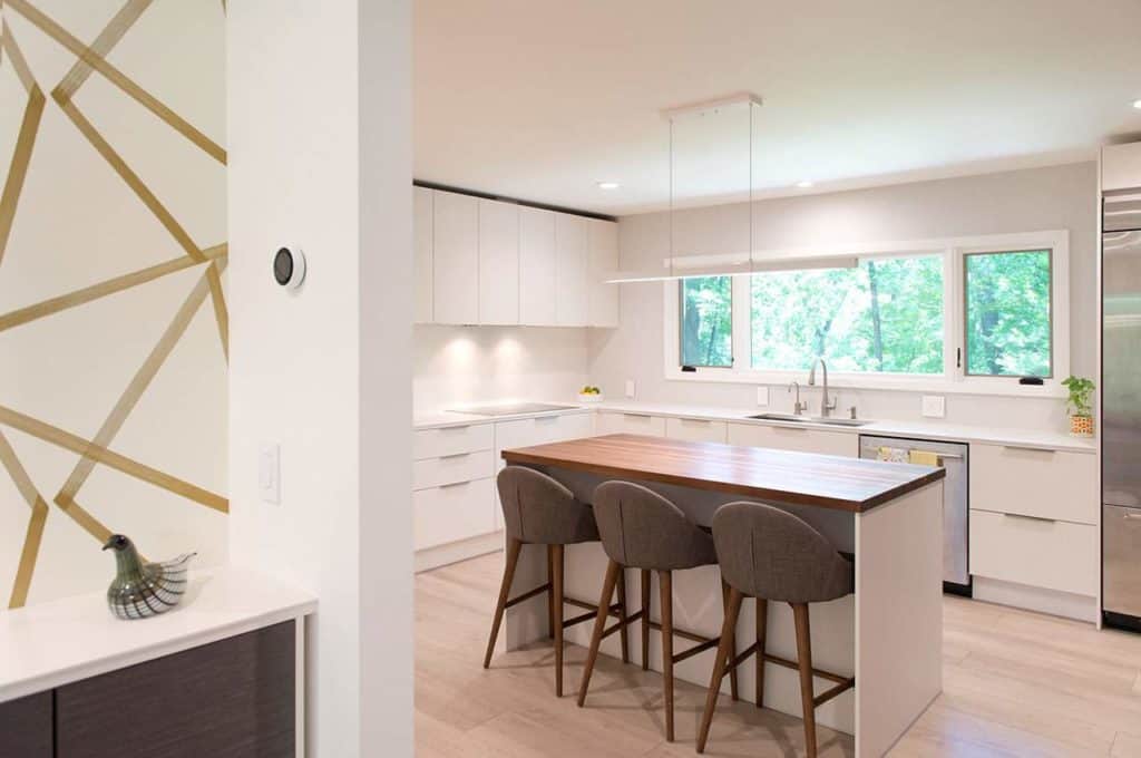 updated family friendly modern white kitchen idea